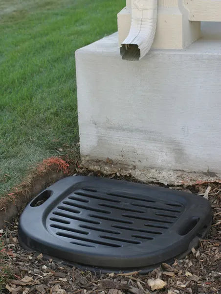 Efficient rainwater pre-filtration system, installed discreetly at the base of a downspout.