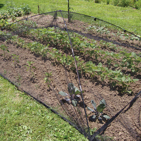 Atlantic-Oase Pond & Garden Protector installed over a garden bed