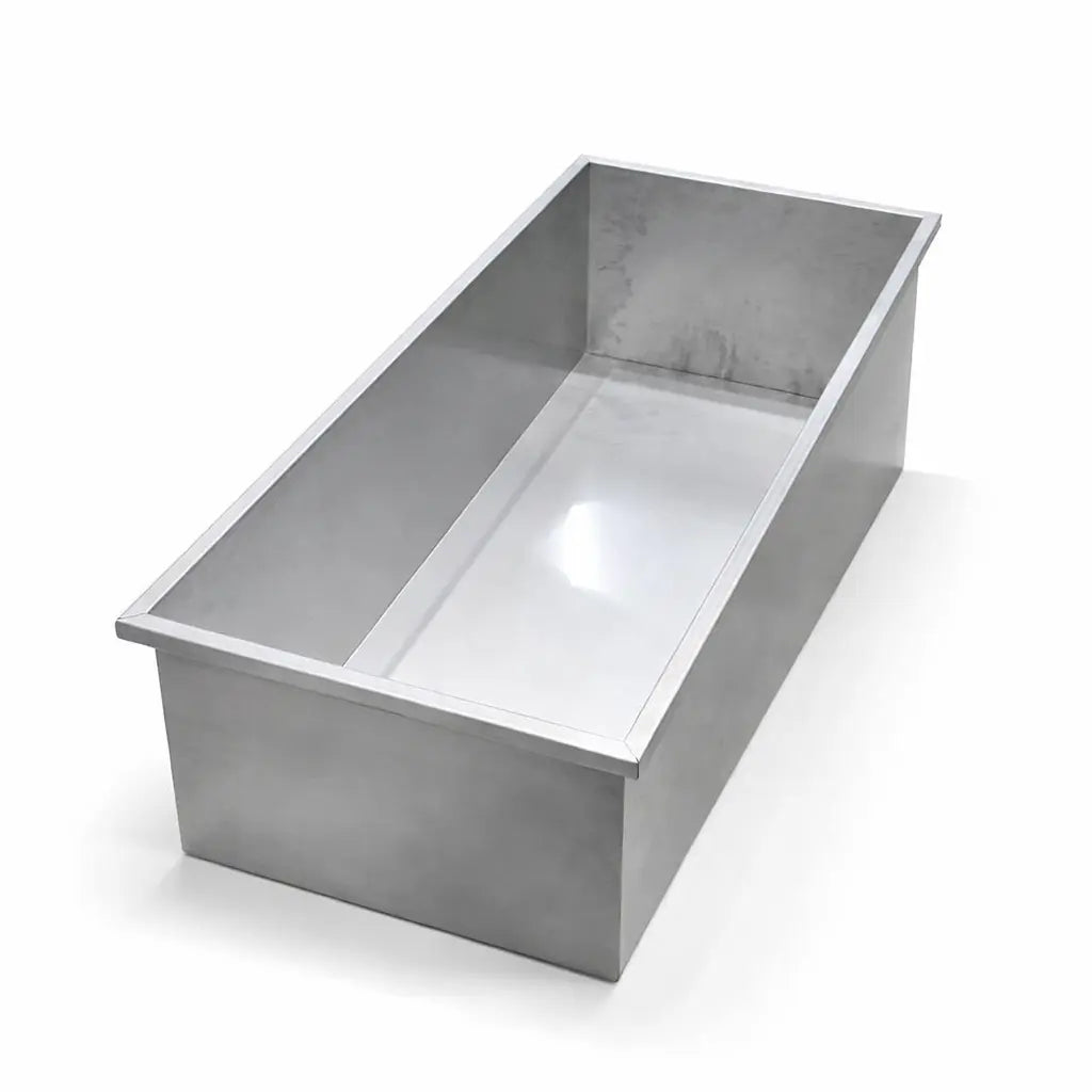 Stainless steel basin on a white background