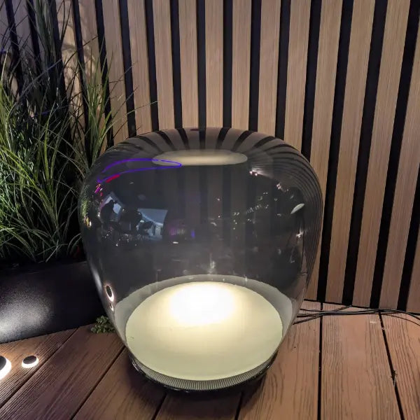 Decorative deck lighting and pathway lanterns for outdoor living spaces.